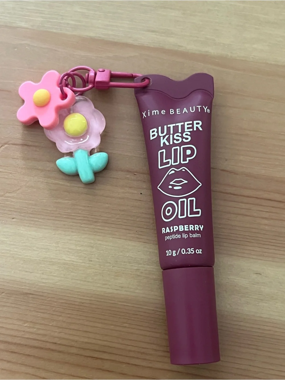 Xime Beauty Butter Kiss Lip Oil in Raspberry